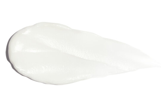 A smear of cream on a blank background.