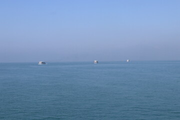 Obraz premium A fleet of Ships sets sail from Teknaf JT, bound for the stunning coral paradise of St. Martin Island, Bangladesh