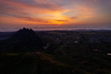 Fototapeta na wymiar Aerial view of the sunrise from top of Le Pouce mountain which is located in Mauritius island