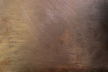 Copper surface. Copper plate. Texture. Left lighting. Design background.