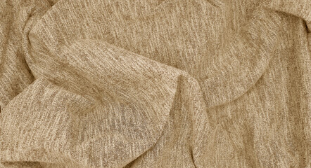 beige crumpled scarf cotton fabric texture, close up view, use as background. folded canvas fabric....