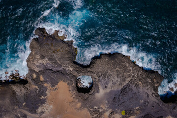 Aerial top view of 'Pont Naturel' which is a natural bridge formed by lava many years ago on the...