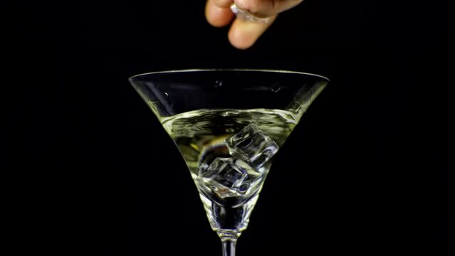 Vermouth aperitif poured into glass . Bitter alcohol spritz
