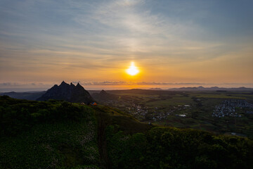Aerial view of sunrise from top of le pouce mountain in Mauritius island