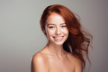 Beautiful cute face of fit girl model with red hair