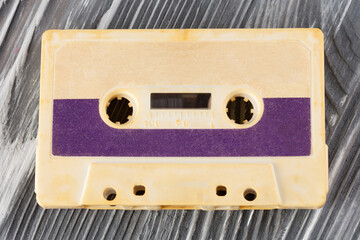 Violet compact cassette with magnetic tape recording format for audio recording and playback. copy...