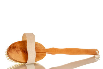 One wooden shower brush, macro, isolated on white background.