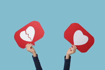 Little girl with heart like and dislike icons on blue background