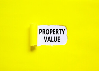 Property value symbol. Concept words Property value on beautiful white paper. Beautiful yellow paper background. Business property value concept. Copy space.