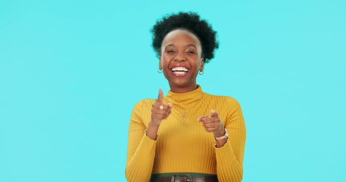 Face, black woman and pointing to you, wink and excited in studio isolated on blue background mockup space. African person, portrait and choice, decision or selection for recruitment, hiring or hr