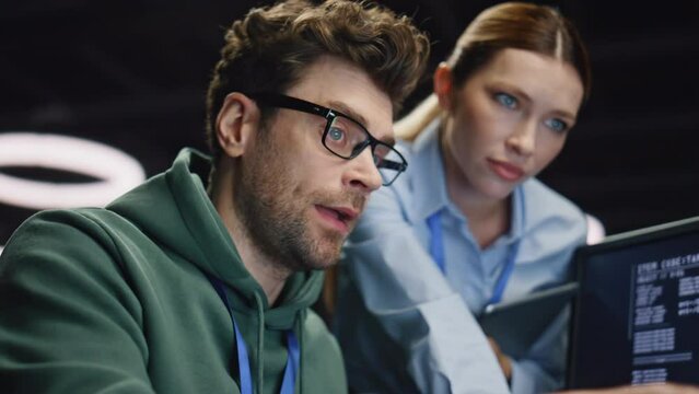 Developers brainstorm work look computer screen at office closeup. Team working