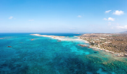 Fototapeta na wymiar Elafonisi Crete island Greece. Aerial drone view of turquoise transparent sea water pink sand beach