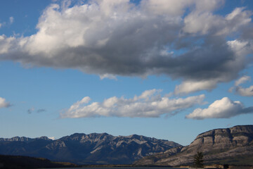 Puffy Clouds Over the Mountain Tops