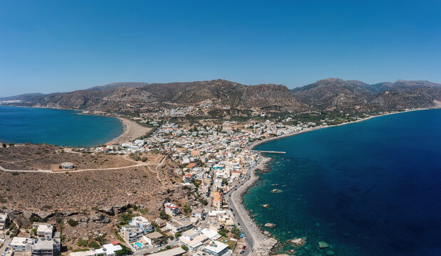 Crete island, Greece. Aerial drone panoramic view of Paleochora town, beach, building, Aegean sea.