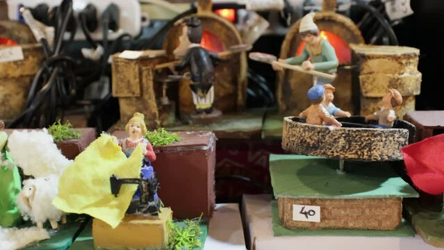 Figurines depicting various professions and jobs of modern society, to creatively integrate the classic tradition of the Christian nativity scene