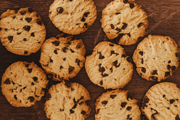 Savoring Simplicity: Homemade Cookies with a Glass of Milk on an Elegant Wooden Table.