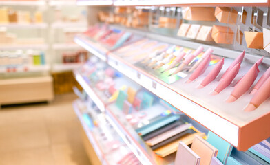 Shelves with makeup products in a cosmetics store indoor.