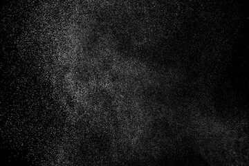Abstract splashes of water on black background. White explosion. Light overlay texture.