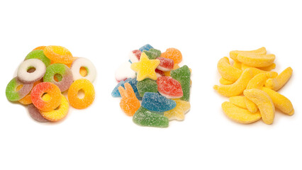 Assorted gummy candies isolated on a white background. Top view.