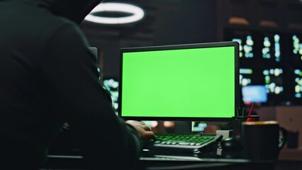 Hacker writing data chroma key computer in night room closeup. Programer working
