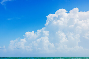 Gorgeous view of sky with fluffy white clouds over Atlantic Ocean in Miami Beach.