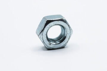 Fasteners. Metal nuts on a white background
