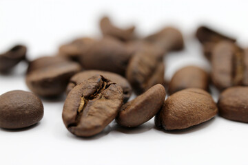 Fresh coffee beans on a white background