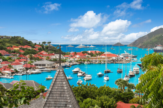 Gustavia, Saint Barthelemy harbor and skyline. Church roof in the front.