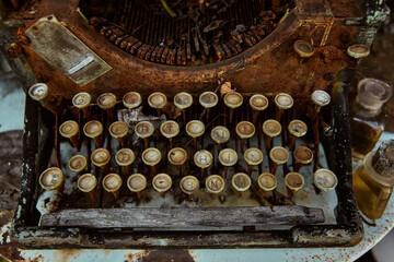 Close-up of an antique rusted typewriter
