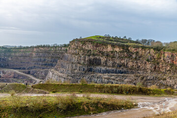 A view across Croft Quarry upper levels towards Croft Hill in Leicestershire, UK on a bright sunny...