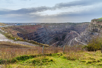 A view towards Croft Quarry from Huncote Nature reserve in Leicestershire, UK on a bright sunny day