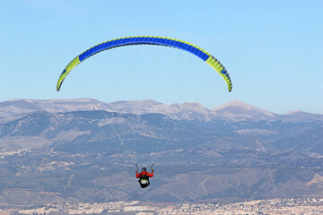 Paraglider flying from Padul in Spain