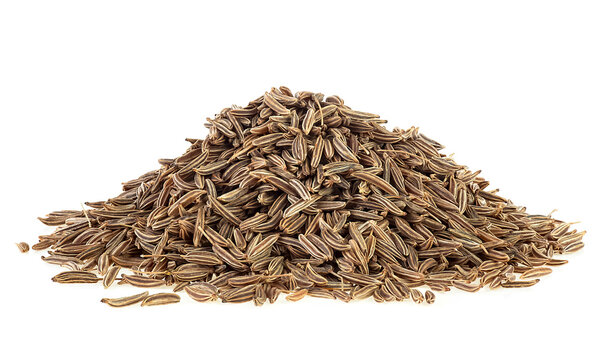 Pile of cumin seeds isolated on a white background. Caraway seeds, indian spice.