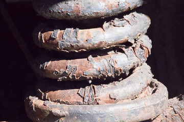 Rusty metal coiled spring