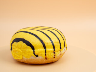 Donut on an orange background. Sweet buns on an orange background.