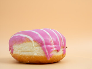 Donut on an orange background. Sweet buns on an orange background.