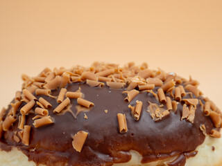 Donut on an orange background. Sweet buns on an orange background.