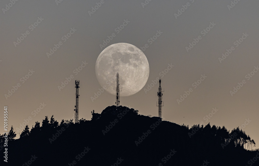 Wall mural full moon in different compositions with multiple exposure