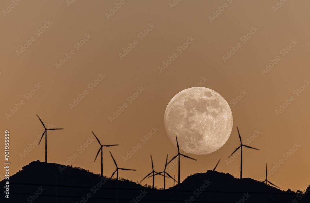 Wall mural full moon in different compositions with multiple exposure