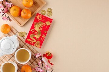 Incorporating the chinese New Year tea ceremony. Top view photo of teapot, cups of tea, tangerines, money envelope, sakura bloom, traditional coins on beige background with promo area