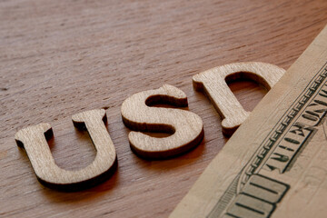 american dollar as the world reserve currency, usd word concept made of wooden letters on wooden...
