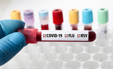 blood sample labeled with covid-a9, flu and rsv virus. Triplemedic sample. Coronavirus, Flu A, B,...