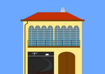 A house with Parisian windows, a cafe and a large gate