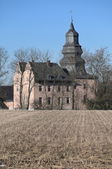 Old manor house with slate tower called Gut Dyckhof in Meerbusch, Germany