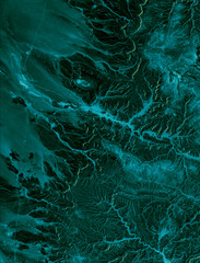 satellite captured Yemen arid desert vivid shades of turquoise, a celestial hue 