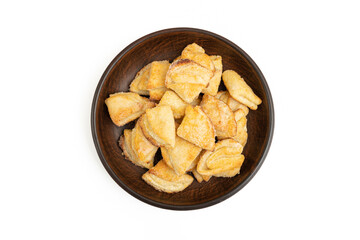 Bowl of homemade cookies on a white background