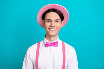 Photo portrait of attractive young man look camera cheerful smile wear trendy pink clothes isolated on cyan color background
