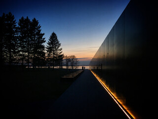 Sunset over Baltic Sea reflected in Maarjamäe memorial in Tallinn, Harjumaa, Estonia, April 2019