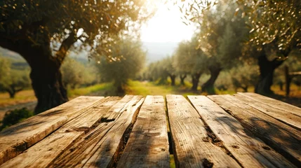 Fotobehang Empty wood table with ample free space against a backdrop of lush olives field. Copy space for text. Organic Agriculture olive oil concept. AI Generative   © Mr. Bolota