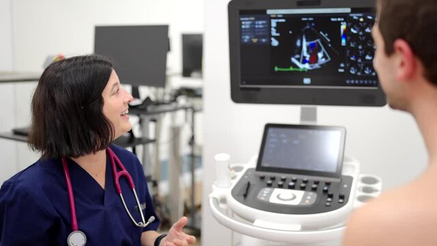 Video of a happy cardiologist explaining the results of a echocardiogram to a patient
